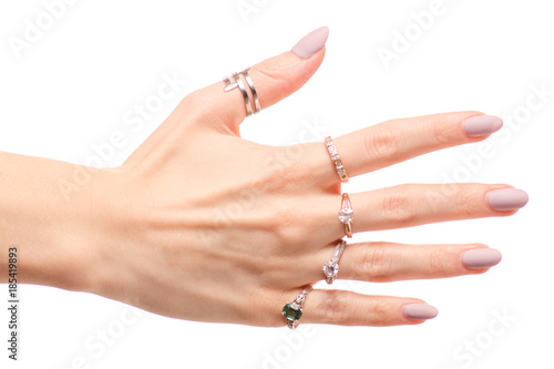 Female hand in rings gold silver