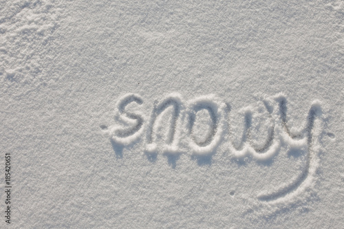 Snow-covered lake. Snow cover. Copy Space. text snowy written finger
