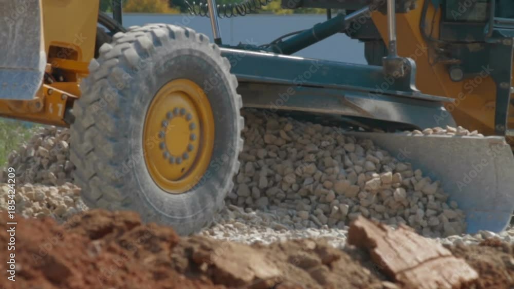 Loader excavator at road construction work Loader excavator at road construction work