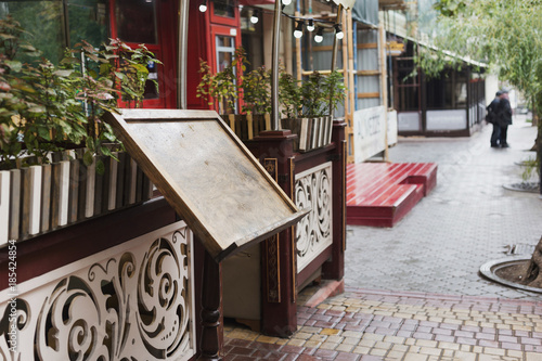 Blank cafe or restaurant menu on the street