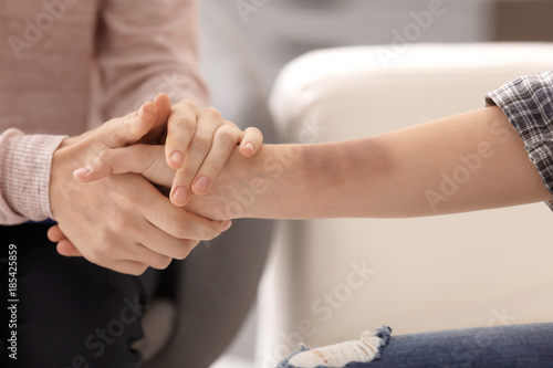 Psychologist working with victim of violence, closeup