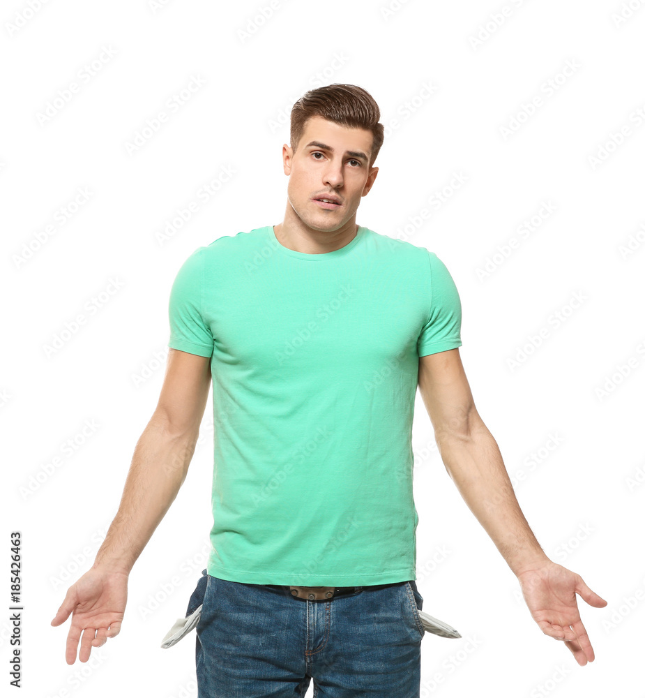Man showing empty pockets on white background Man showing empty pockets on white background