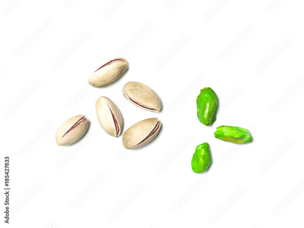 Roasted and salted pistachios isolated on white backround Roasted and salted pistachios isolated on white backround