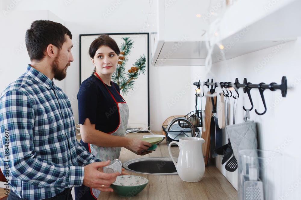 Male and female chefs working at kitchen Male and female chefs working at kitchen