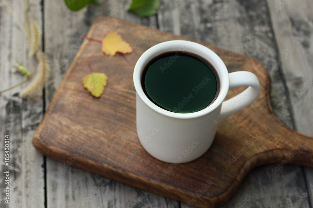 Hot coffee black coffee on wood table
Hot coffee black coffee on wood table