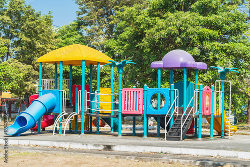 playground in the park with green tree background