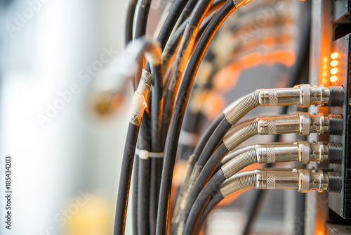 network cables connected to a switch and patch-panel,internet concept background,symbol of global communications