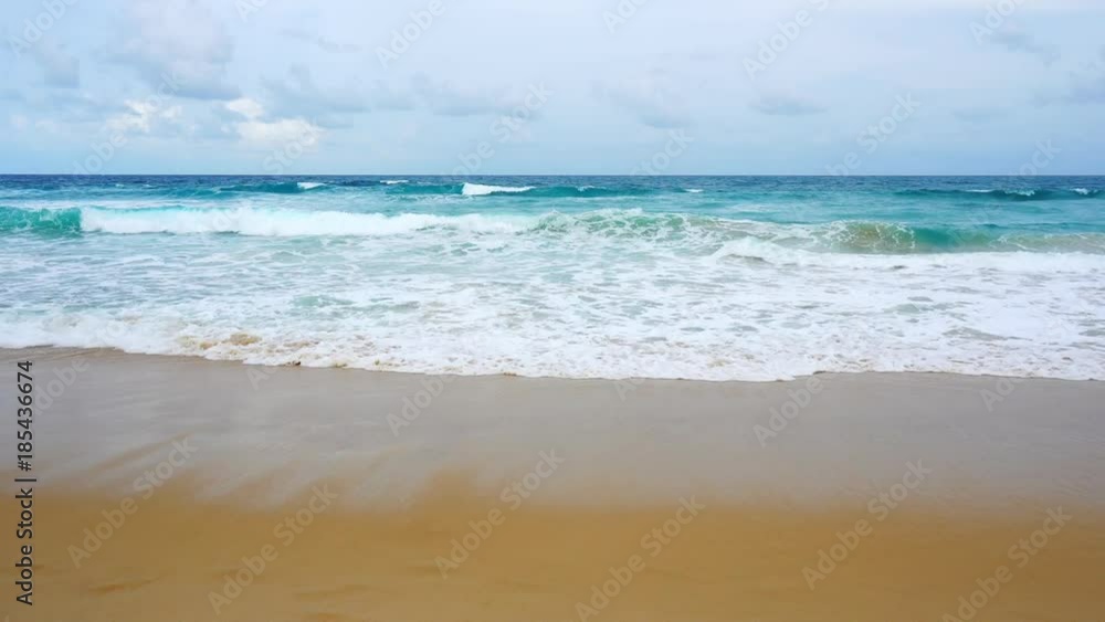 tropical andaman seascape scenic off kata beach phuket thailand with wave crashing on sandy shore tropical andaman seascape scenic off kata beach phuket thailand with wave crashing on sandy shore