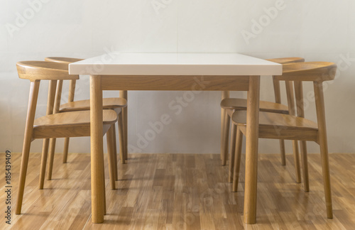 White table in white room with low angle view