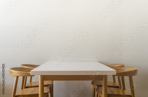 White table in white room and empty space