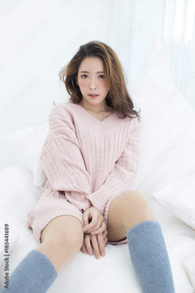 Asian Woman wake up on bed with happy emotion, People lifestyle concept. Asian Woman wake up on bed with happy emotion, People lifestyle concept.