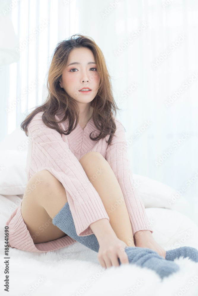 Asian Woman wake up on bed with happy emotion, People lifestyle concept. Asian Woman wake up on bed with happy emotion, People lifestyle concept.