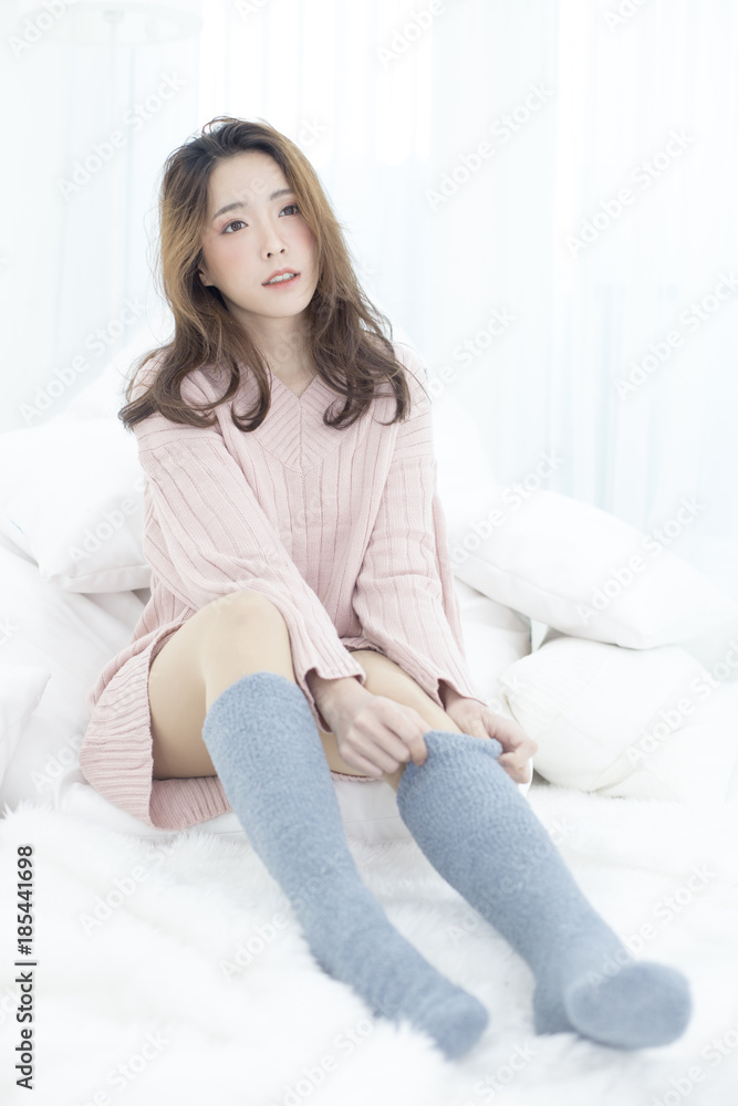 Asian Woman wake up on bed with happy emotion, People lifestyle concept. Asian Woman wake up on bed with happy emotion, People lifestyle concept.