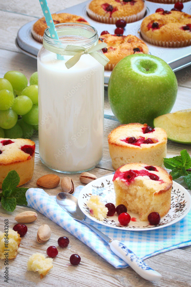 Muffins with cranberries, fruit and milk for Breakfast Muffins with cranberries, fruit and milk for Breakfast