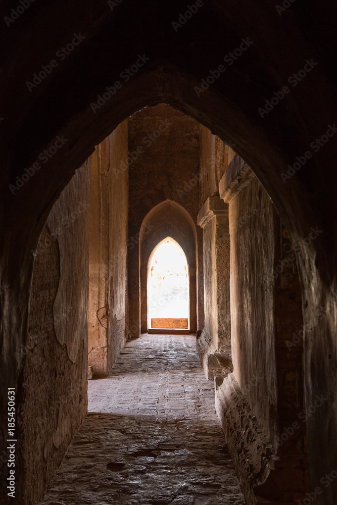 Empty, dark and arched gateway and corridor inside the Sulamani Temple in Bagan, Myanmar (Burma).