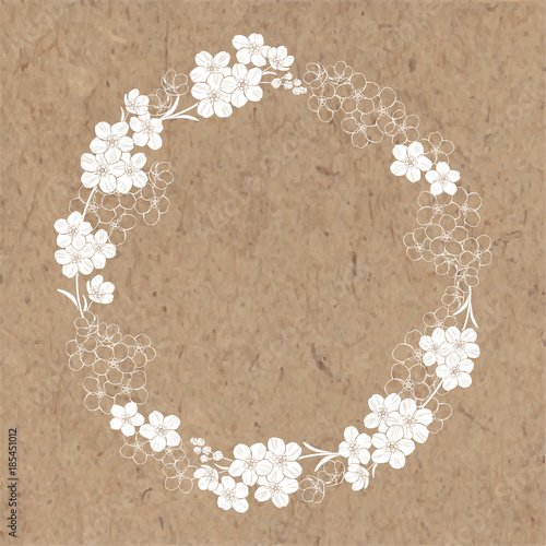 Round frame with forget-me-nots. Nature wreath. Vector illustration on a kraft paper with  place for text. Invitation, greeting card or an element for your design.