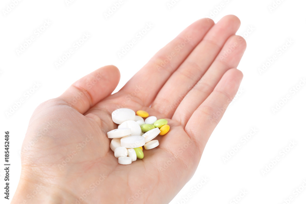 pills in woman hand pills in woman hand