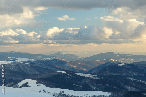 Soaring above the clouds - beautiful winter landscape on a mountain top