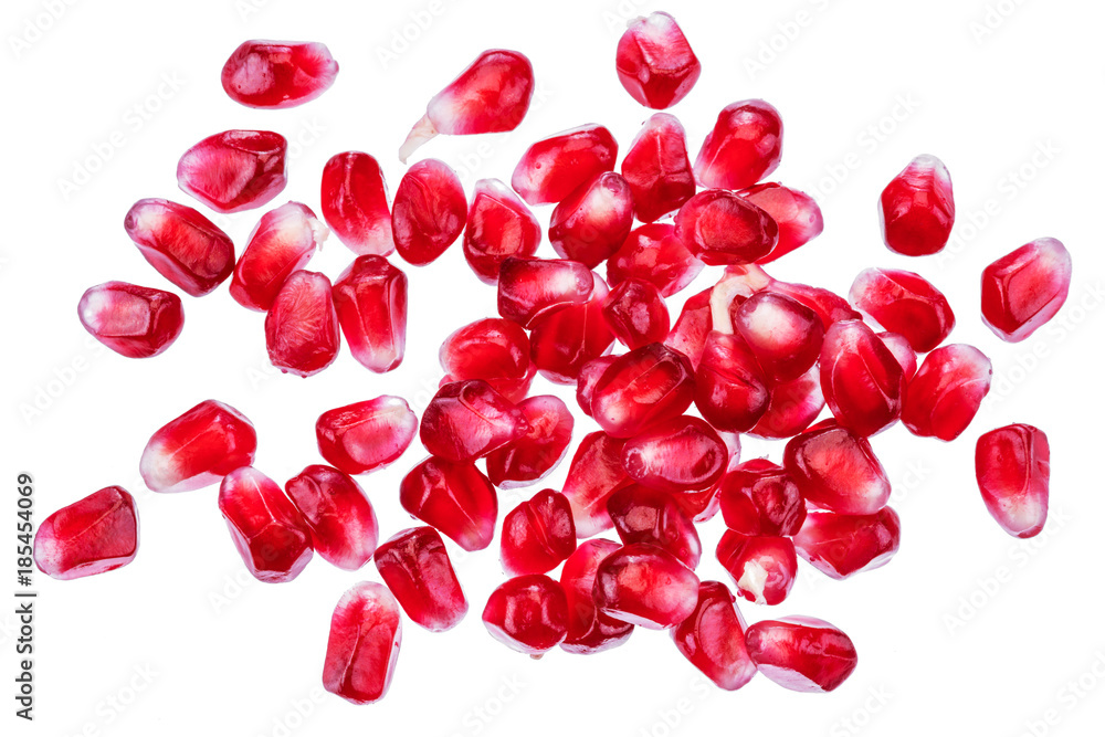 Ripe pomegranate seeds on the white background. Ripe pomegranate seeds on the white background.