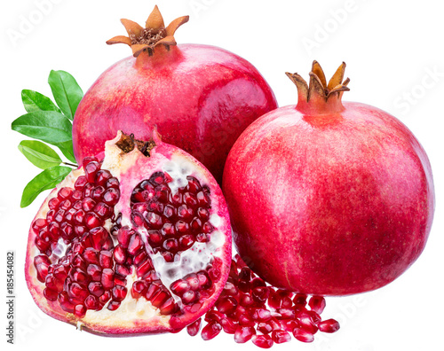 Ripe pomegranate fruits on the white background.