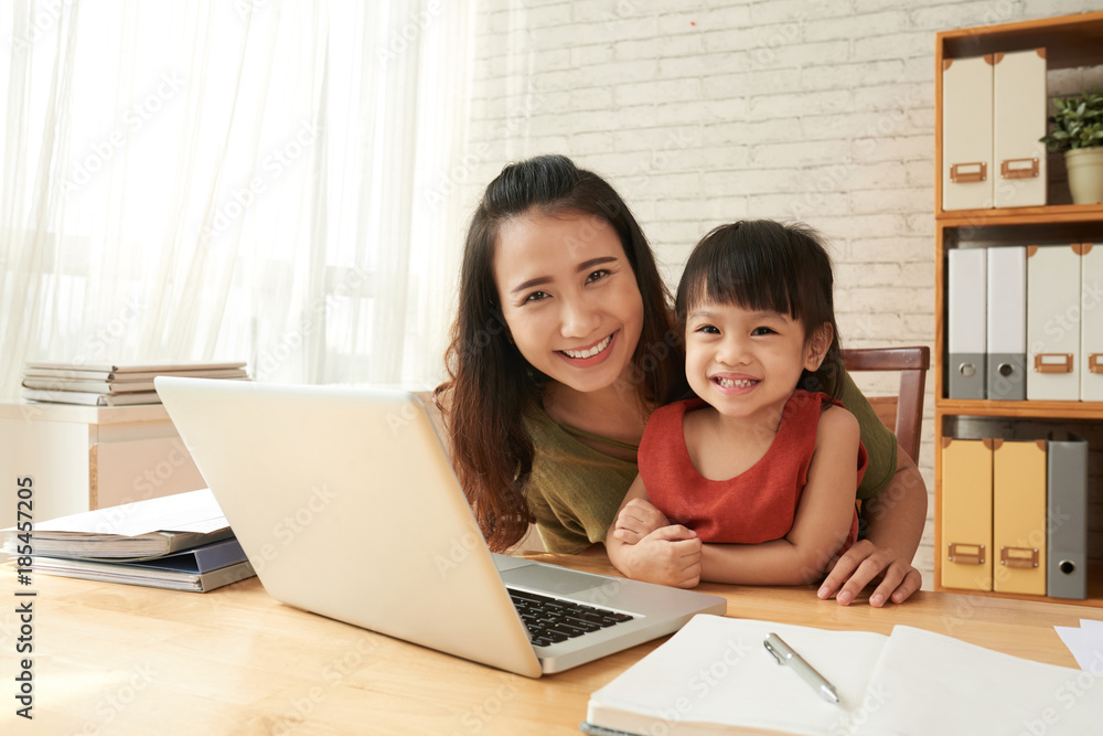 Working mom and her daughter Working mom and her daughter