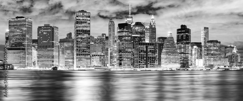 Black and white New York City skyline at night, USA..