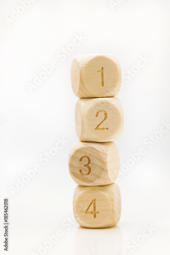 Wooden blocks are sorted in ascending order on vertical.