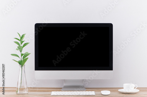 Workplace with computer on table in modern room