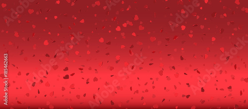 Heart confetti of Valentines petals falling on pink background. Flower petal in shape of heart confetti for Women's Day