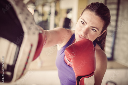  Woman with boxer glove © liderina