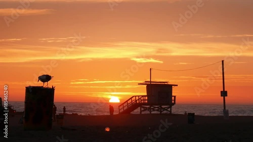 Lifeguard tower silhouette at sunset Santa Monica Venice Beach Los Angeles