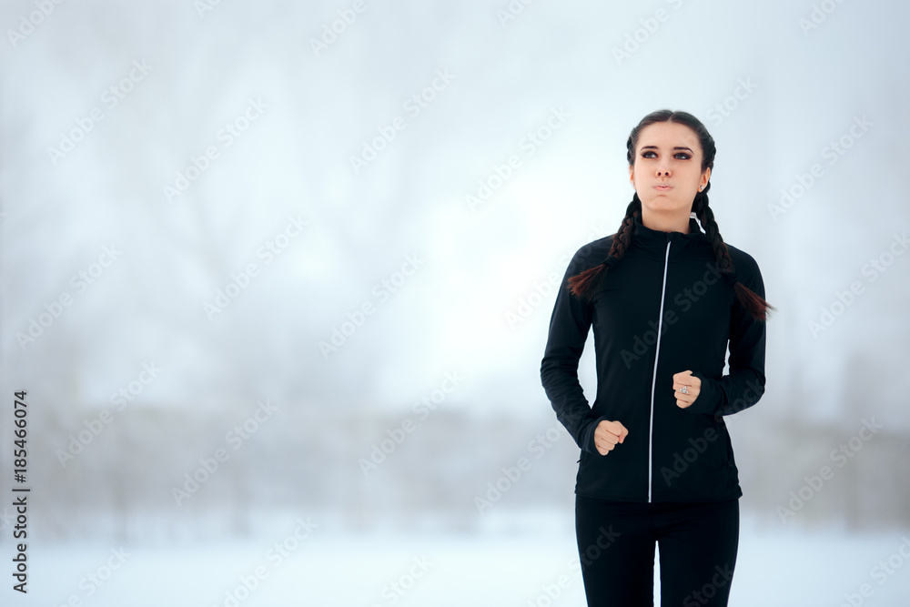 Tired Winter Running Woman Exercising Outside Training Cardio in Cold Season Tired Winter Running Woman Exercising Outside Training Cardio in Cold Season