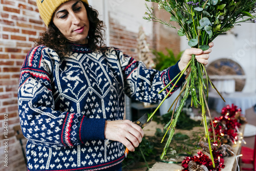 Person cutting twigs photo