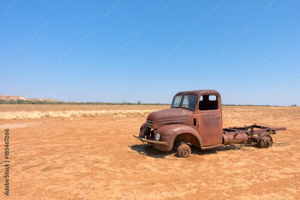 Abandoned truck in dry landscape in Queensland Abandoned truck in dry landscape in Queensland