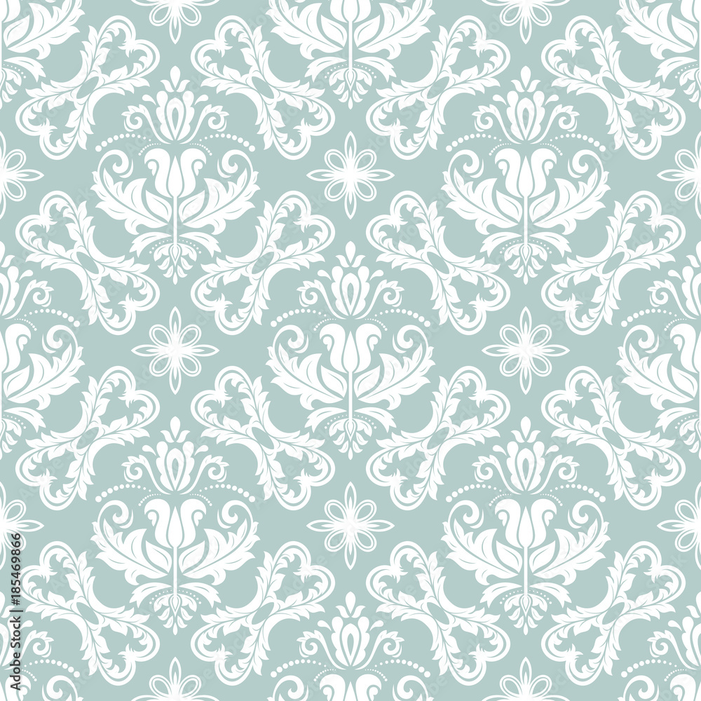 Damask classic blue and white pattern. Seamless abstract background with repeating elements. Orient background Damask classic blue and white pattern. Seamless abstract background with repeating elements. Orient background