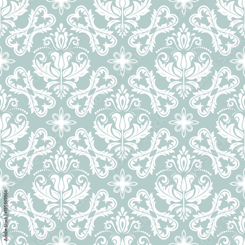 Damask classic blue and white pattern. Seamless abstract background with repeating elements. Orient background