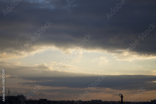 Sunset sky and cloud with siluate city scape