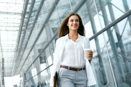 Beautiful Woman Going To Work With Coffee