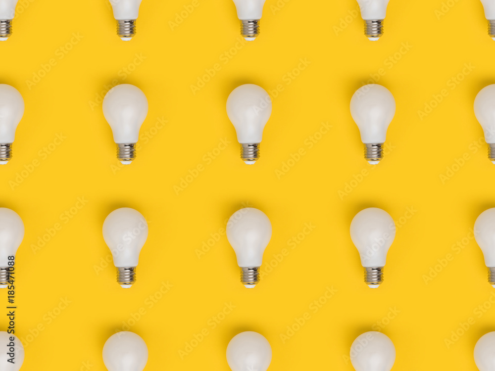 full frame of arrangement of light bulbs isolated on yellow full frame of arrangement of light bulbs isolated on yellow