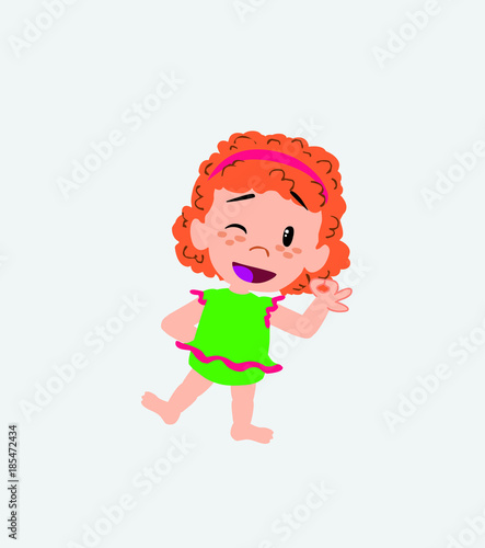 White girl in a swimsuit doing the OK sign with his hand.