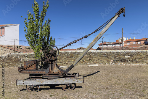 Rusty old winch crane used in a stone quarry