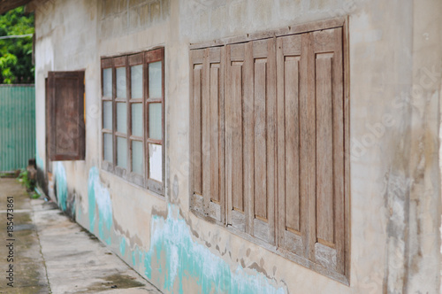 wood windows of concreat house photo