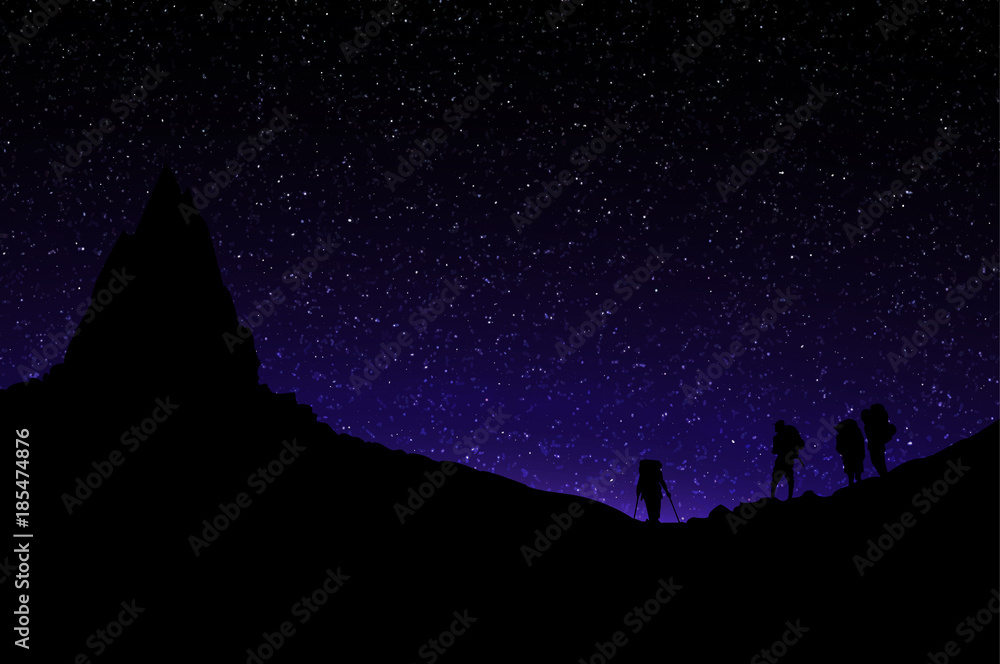 Silhouette of Mountainers Standing under Mountai Peak. Starry Sky.