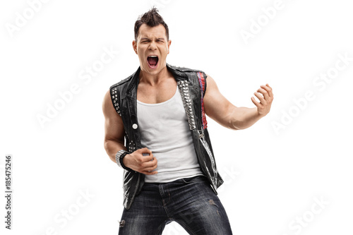 Punk rocker playing air guitar photo