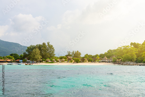 Fototapeta Naklejka Na Ścianę i Meble -  Heavenly green tropical island with clear sea and corals