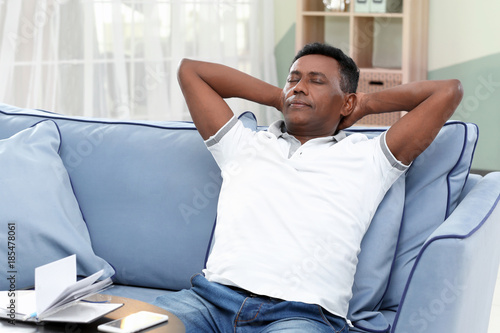 Mature African-American man resting at home © Africa Studio