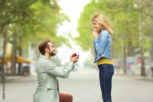 Young man with engagement r...