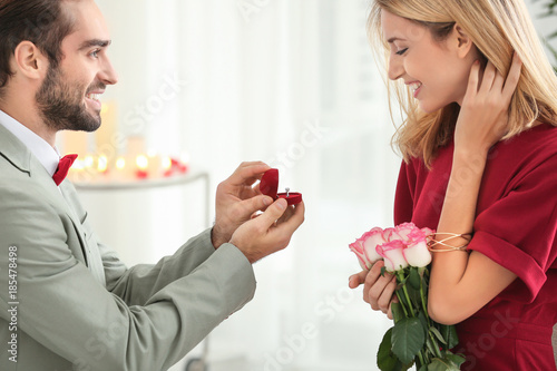 Young man with engagement r...