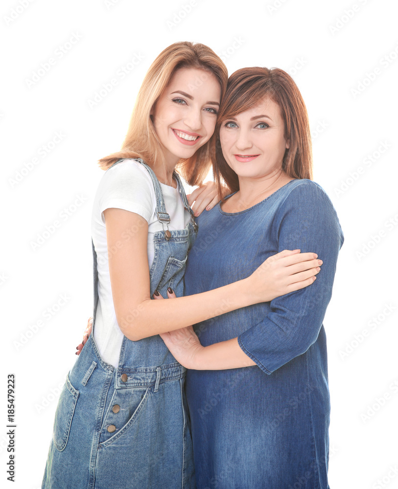 Attractive young woman with her mother on white background Attractive young woman with her mother on white background