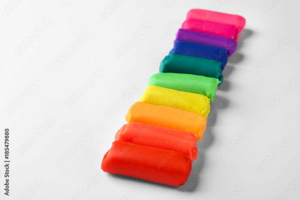 Rainbow play dough on white background Rainbow play dough on white background